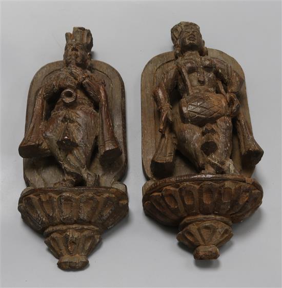 Two 19th century hand carved Indian statuettes height 29cm